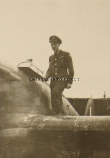 Peter Provenzano Photo Album Image_copy_064.jpg - Peter Provenzano on the wing of Hawker Hurricane I.  RAF Station Kirton Lindsey, winter of 1941.